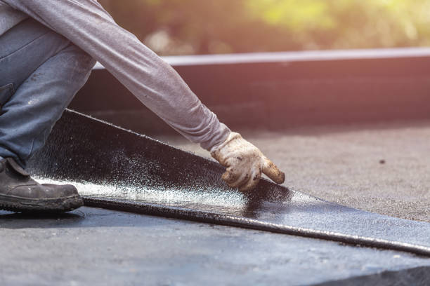 Professional Basement Waterproofing technician working in Wild Rose, WI